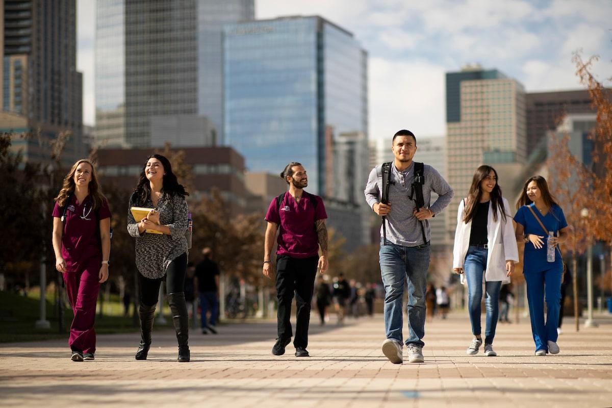 Health Administration and medical students walking through Auraria Campus in between classes.